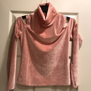 Long sleeved cold shoulder shirt with turtleneck